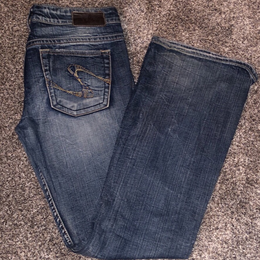 Silver jeans.